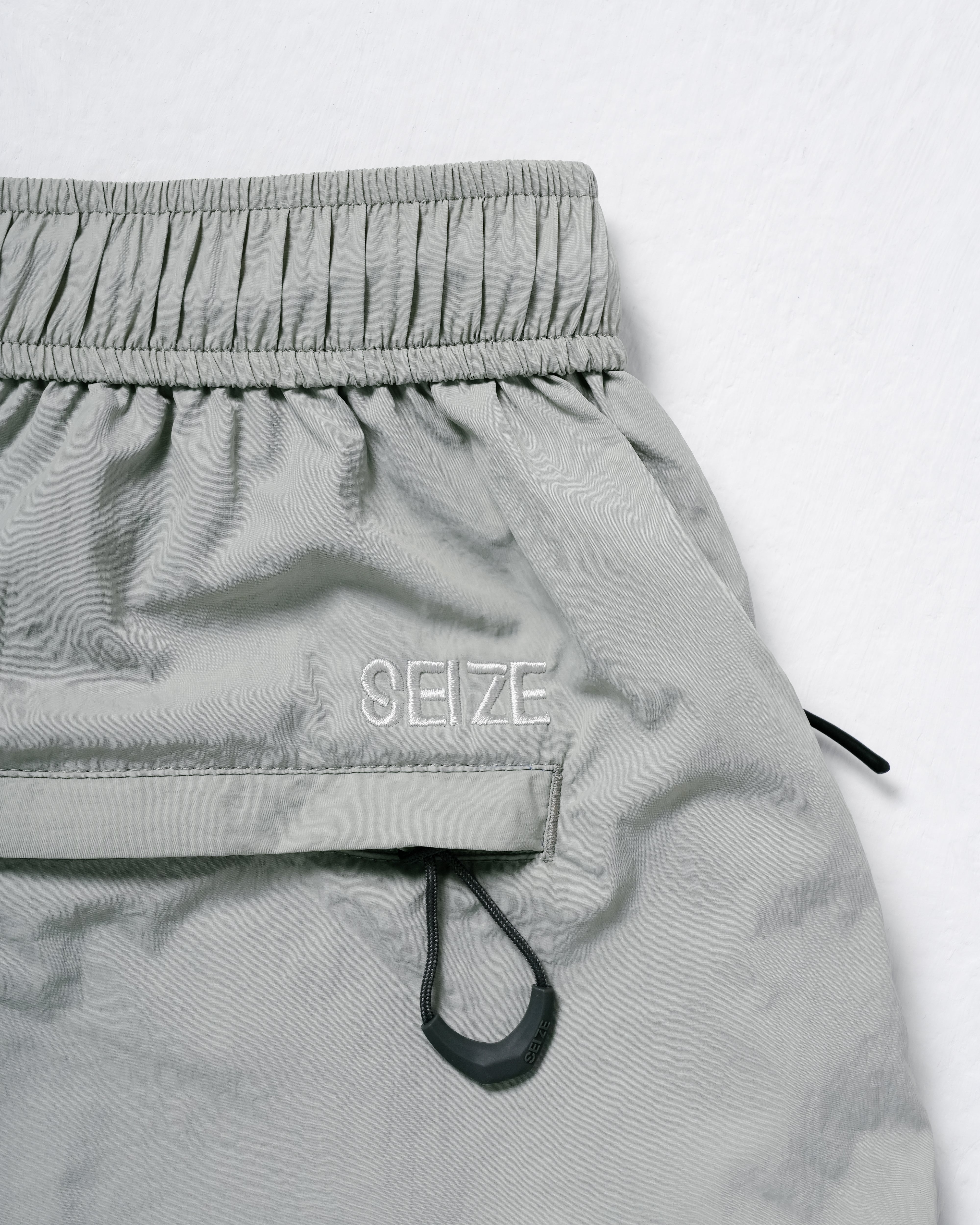 SEIZE 23SS - TECH SUN PROTECTION LIGHT SHORTS - TANA GREEN